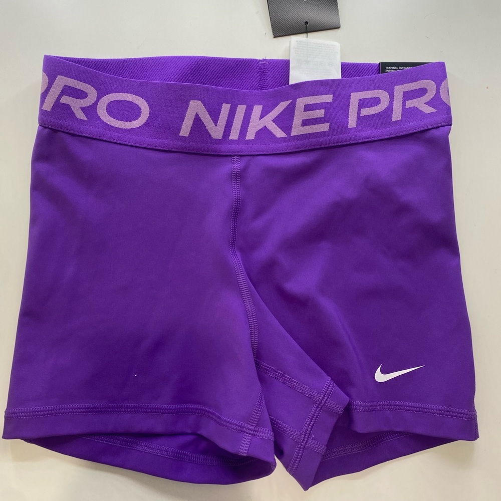 Purple Nike spandex shorts